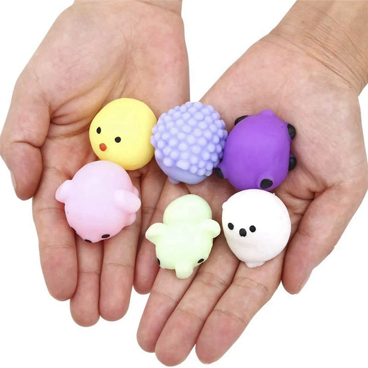 Squishy Toy 24Pcs bomboniere per bambini, giocattoli per l'ansia antistress giocattolo Mochi, Stuffers per cestini pasquali con contenitore