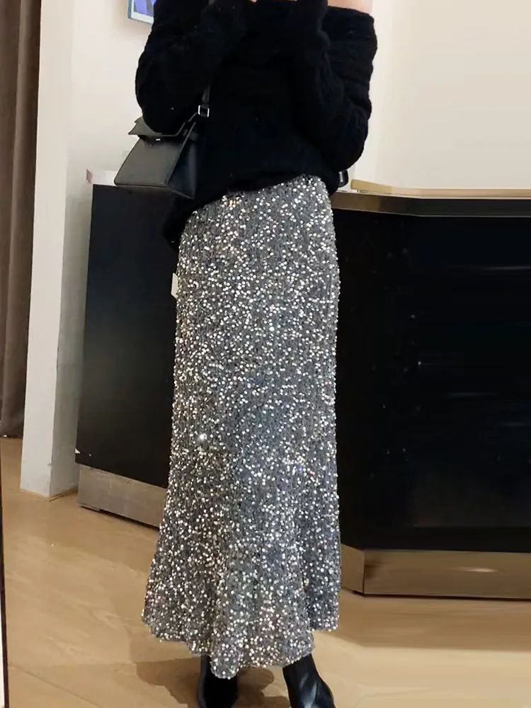 

Новая драпированная юбка-накидка Ele с серебряными пайетками, осень 2024, модель Aosphere Ele, женственная, средней длины, для любого типа фигуры