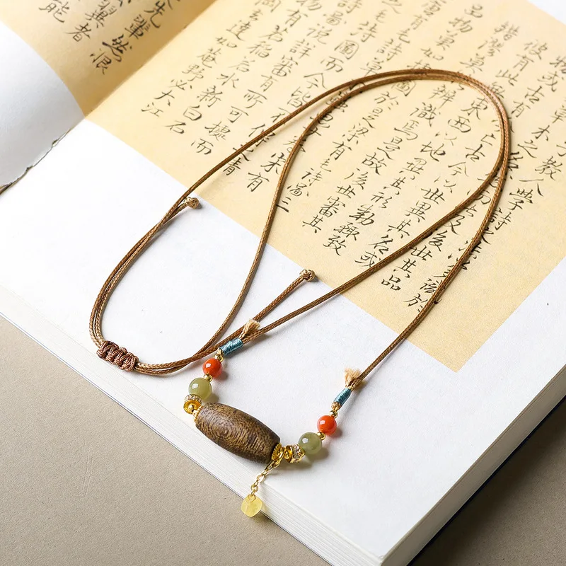 Original design green Qinan agarwood bead necklace, new Chinese-style amber and Hetian jade sweater chain