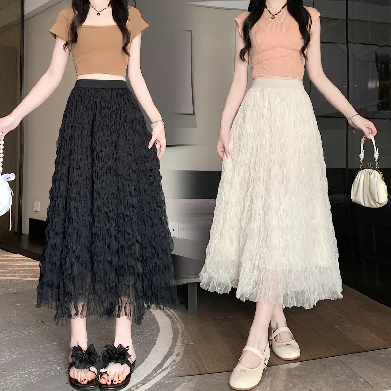 Mesh half skirt for women in spring and summer, new casual high waisted slimming and versatile wrinkled wave long skirt