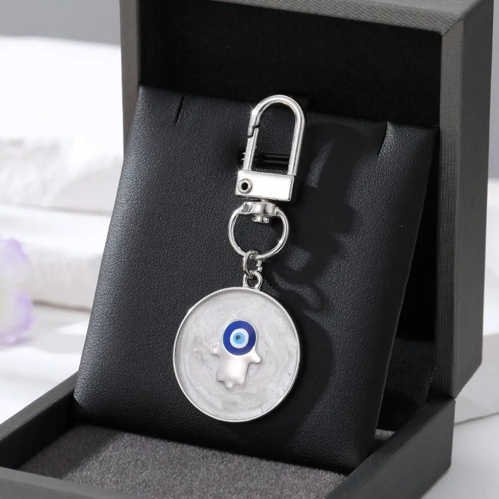 LLavero de ojo de demonio y estrella de resina creativa, colgante de ojo azul turco de Palma de aleación, colgantes para coche, estilo popular diario