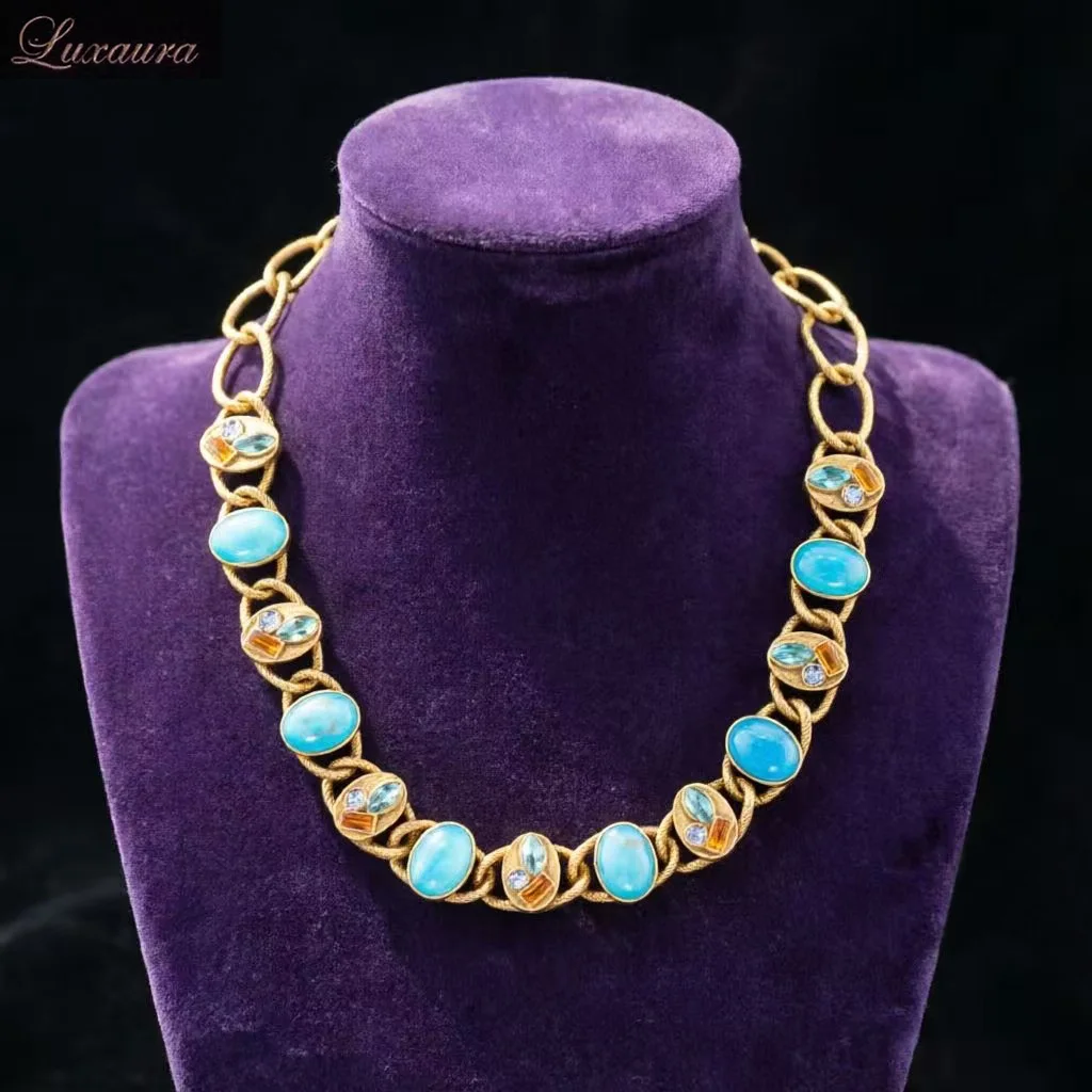 

Vintage jewelry featuring a fashionable and classic blue geometric necklace design paired with Bohemian style women's necklace