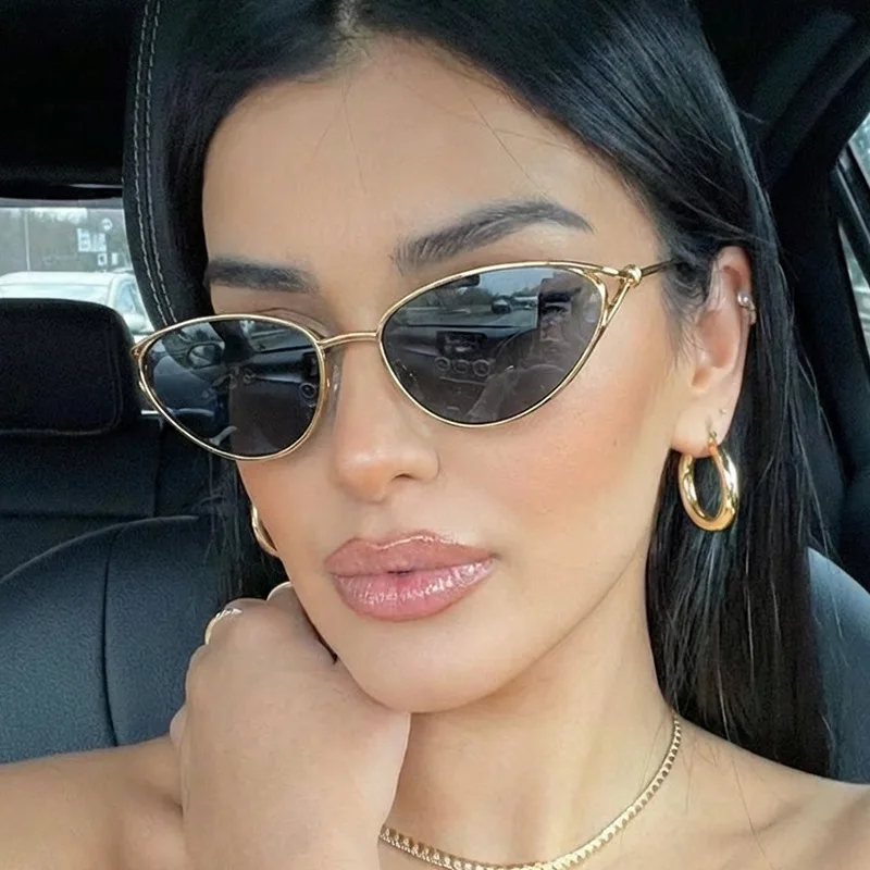 

Small frame cat-eye metal sunglasses in a vintage knot design, featuring a bold and edgy look perfect for a cool girl.