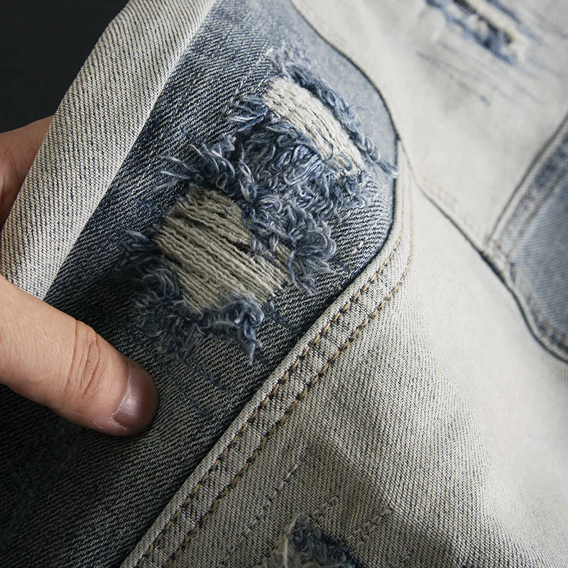 Splicing denim jeans with men's ripped patch design, stylish street style, stretchy, slim fit, small straight leg, trendy pants