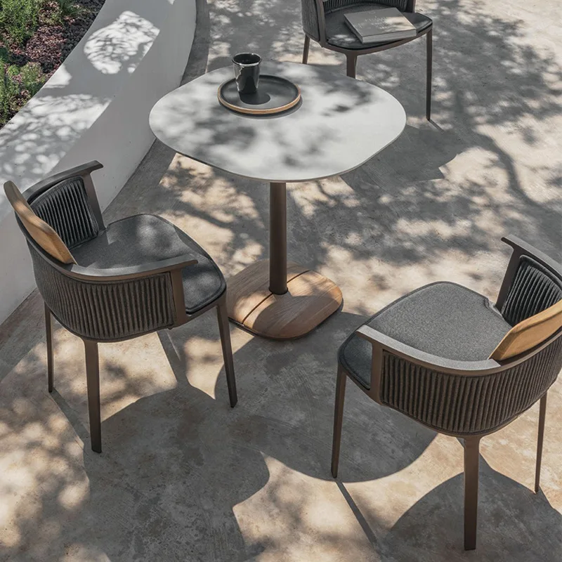 Outdoor tables and chairs Garden furniture Balcony teak rattan chair three-piece outdoor cafe rattan dining chair rattan art
