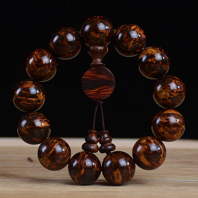 

Myanmar Small Leaf Vine Fragrant Wood Bracelet Firework Pattern Scar-like Hainan Huanghuali Buddha Beads Wholesale Prayer Beads