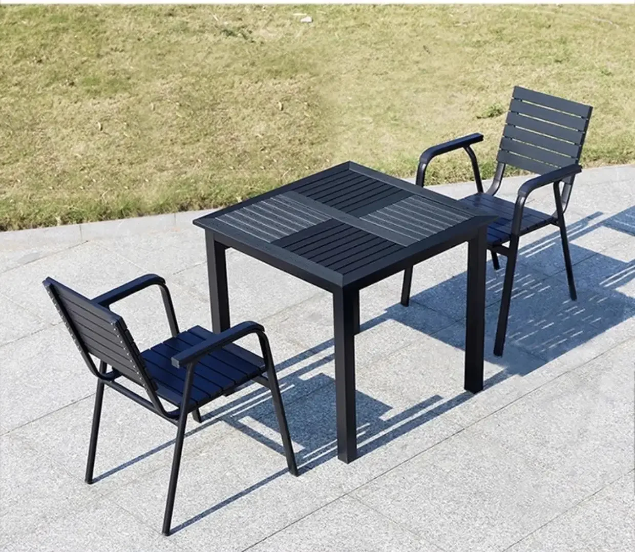 

A Outdoor bistro table and chair set PE plastic wooden frame chair with armrests for hotel restaurant use