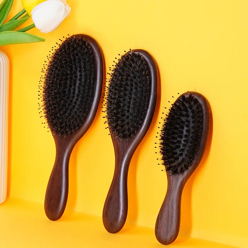 

Ebony bristle hair care massage air cushion comb smooth clean high elastic airbag comb stock wholesale