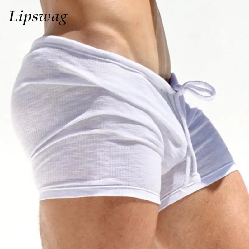 Pantalones cortos ajustados elásticos para hombre, ropa de dormir informal, Sexy, de punto acanalado, Color sólido, verano, 2024