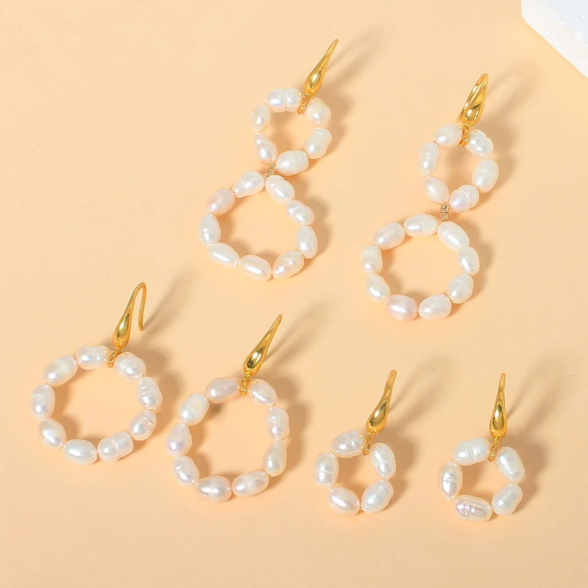 

Beautiful rice shaped natural freshwater pearl copper accessory ear hook