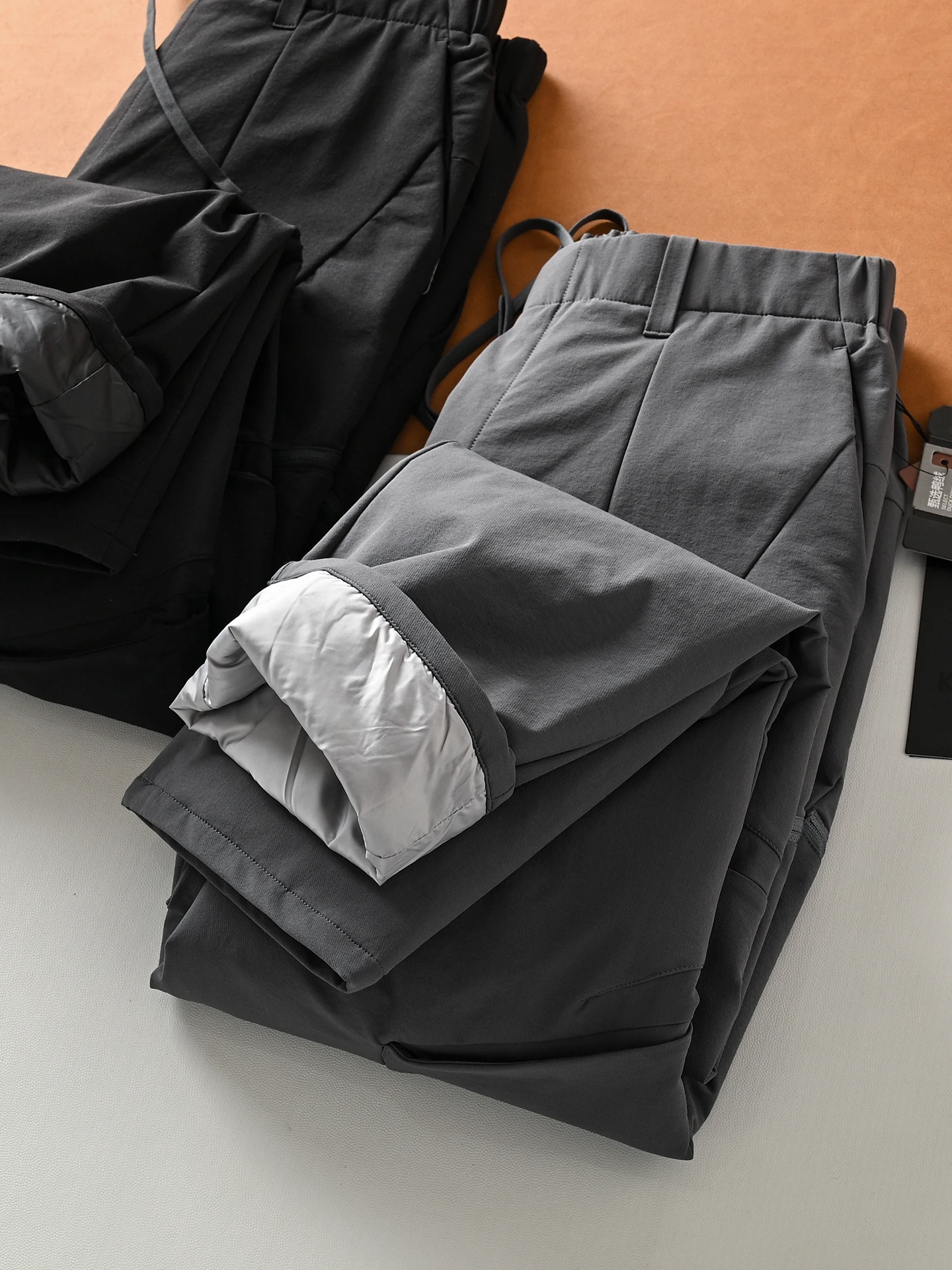 

Уличные мужские прямые пуховые брюки, модные городские теплые повседневные длинные брюки, футболка, осенне-зимняя куртка...