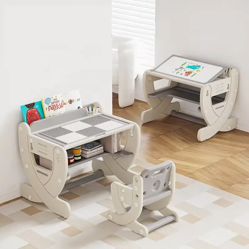 Plastic height adjustable multi-functional children's building block activity table with drawing board