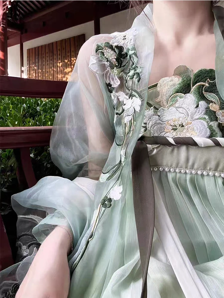 Traje de vestido de elementos tradicionales bordados a máquina de ropa china Han para mujer