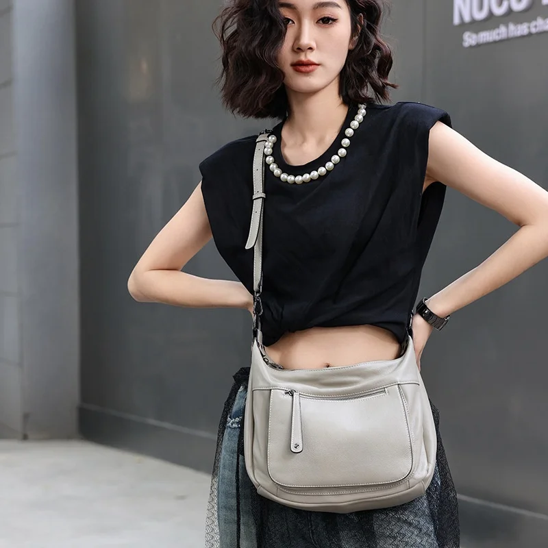 ผู้หญิงHoboกระเป๋าCrossbodyของแท้หนังกระเป๋าถือหญิง 2025 ใหม่แฟชั่นกระเป๋าสะพายอเนกประสงค์สีทึบCowhideนุ่มกระเป๋า