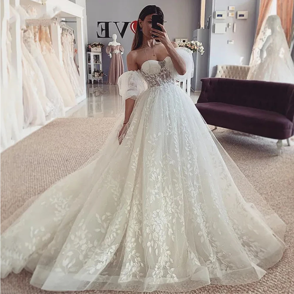 

Beautiful Romantic Wedding Dresses Sexy Backless Exquisite Lace Applique Off Shoulder Fluffy Sleeves Mopping Bride Gown A-Line