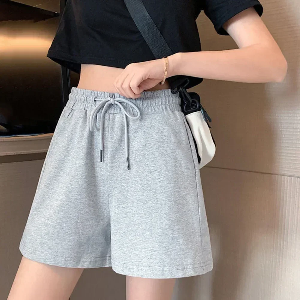 Calções de verão saias femininas elásticas cintura alta casual perna larga shorts coreano uma linha solta mini saia preto calças curtas