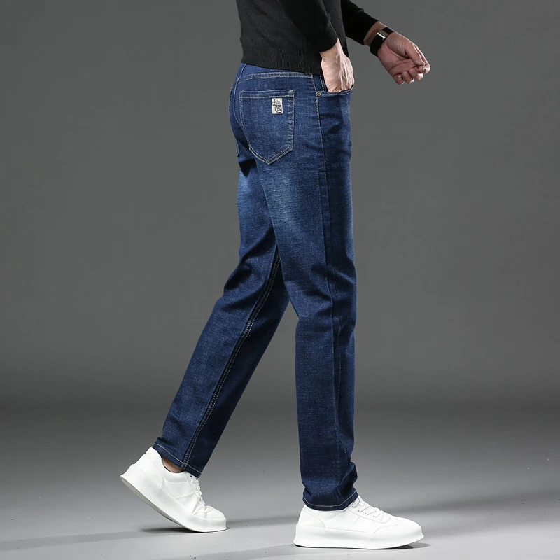 Jeans dritti in Denim da uomo per tutte le stagioni nuovi pantaloni in Denim Casual Business pantaloni quotidiani di marca classica di alta qualità