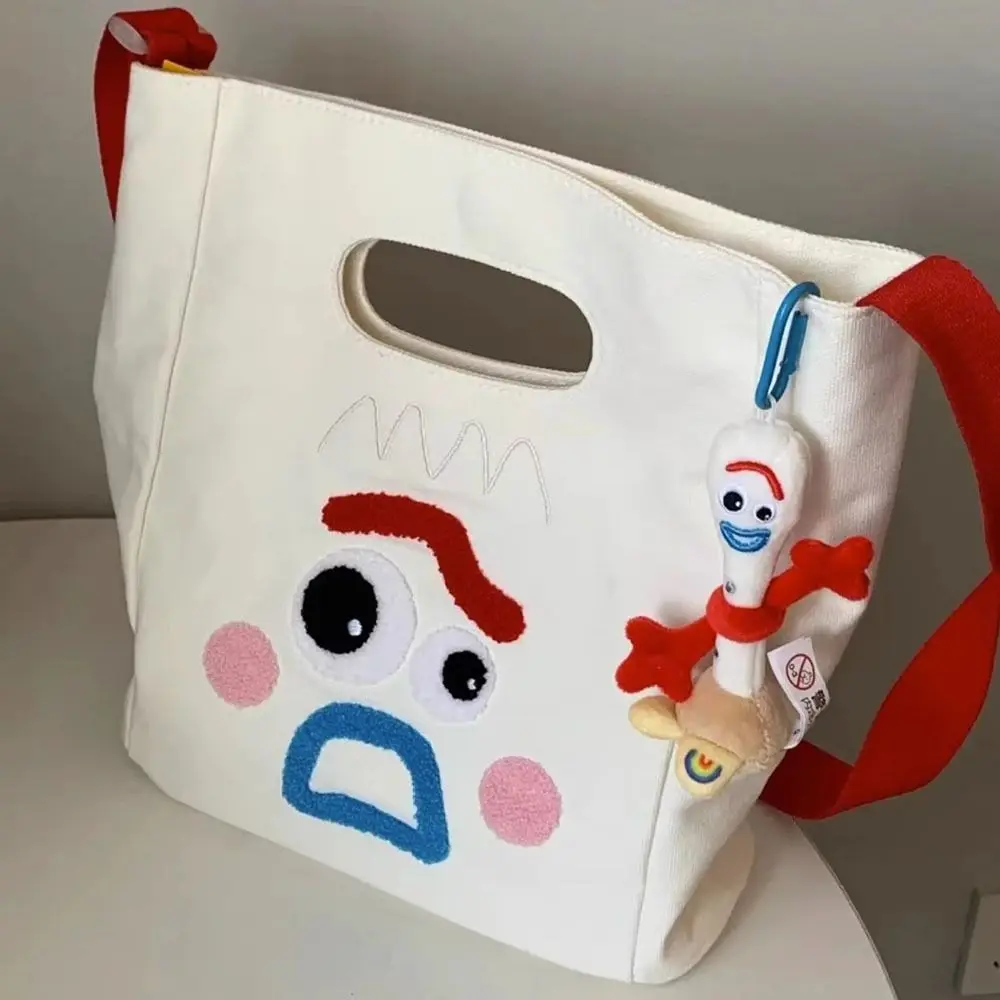 

High-Capacity Strange Expression Canvas Bags Adjustable Straps Magnetic Buckle Closure Cute Expression Tote Bag Multi-functional