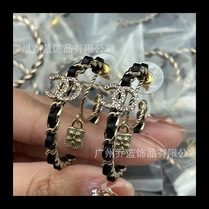 

High-end Pair, Double C Double-layer Lock, Black Perforated Leather Rope Stud Earrings, Femininity, Premium Earrings