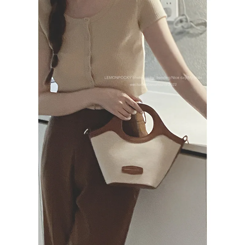 French minority design handbag bag female 2023 new fashion contrast stitching bucket bag high sense messenger bag