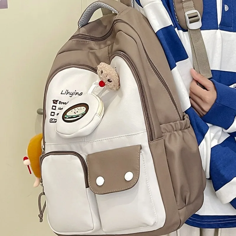 Mochila escolar Kawaii para estudiantes universitarios, morral de viaje ligero de gran capacidad con bonito colgante para adolescentes