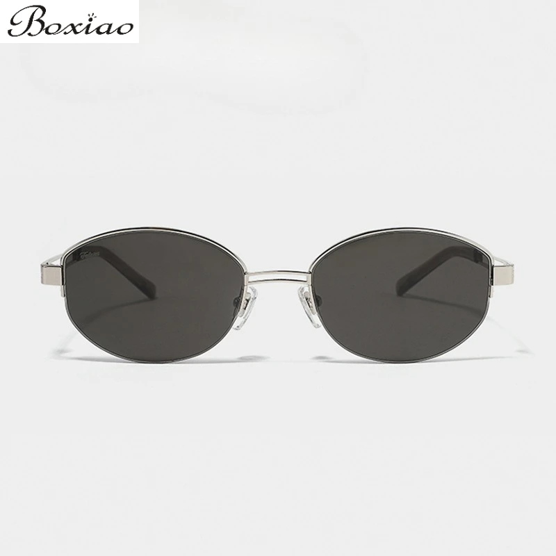 

Поддельные солнцезащитные очки в Шэньчжэне с одинаковыми старыми деньгими в стиле Advanced Sense Овальные солнцезащитные очки в полуоправе с косточкой.