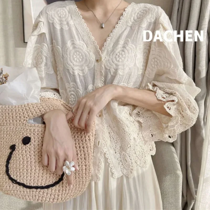 Blouse cotton lace hook flower three-quarter sleeve gentle wind cardigan top Korean version all-match loose knitted sweater