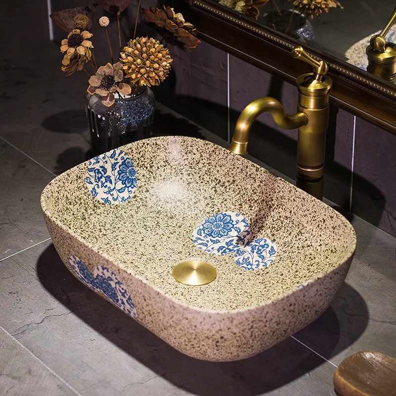 

China Artistic Handmade Engraving Ceramic wash basin Lavobo Round Countertop handmade ceramic sinks