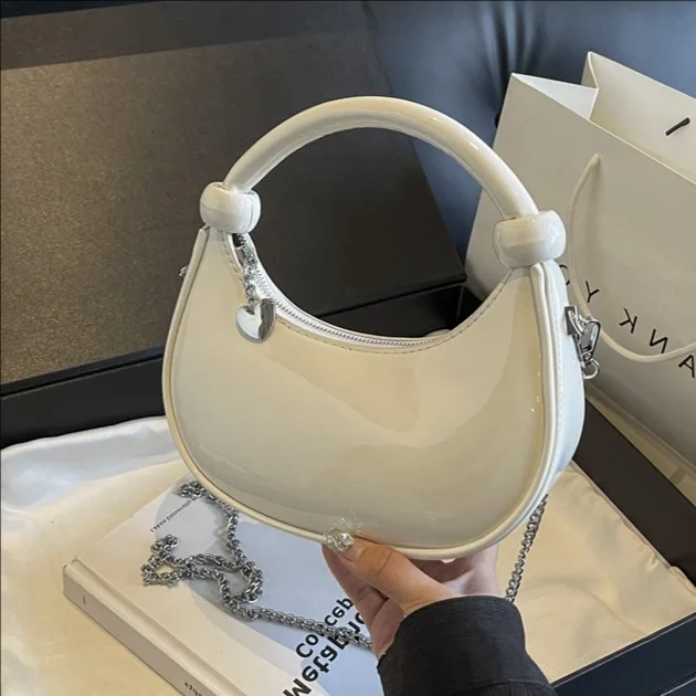 

Handheld fashion trend dumpling bag for women 2025 new simple and casual versatile shoulder bag, niche design crossbody bag