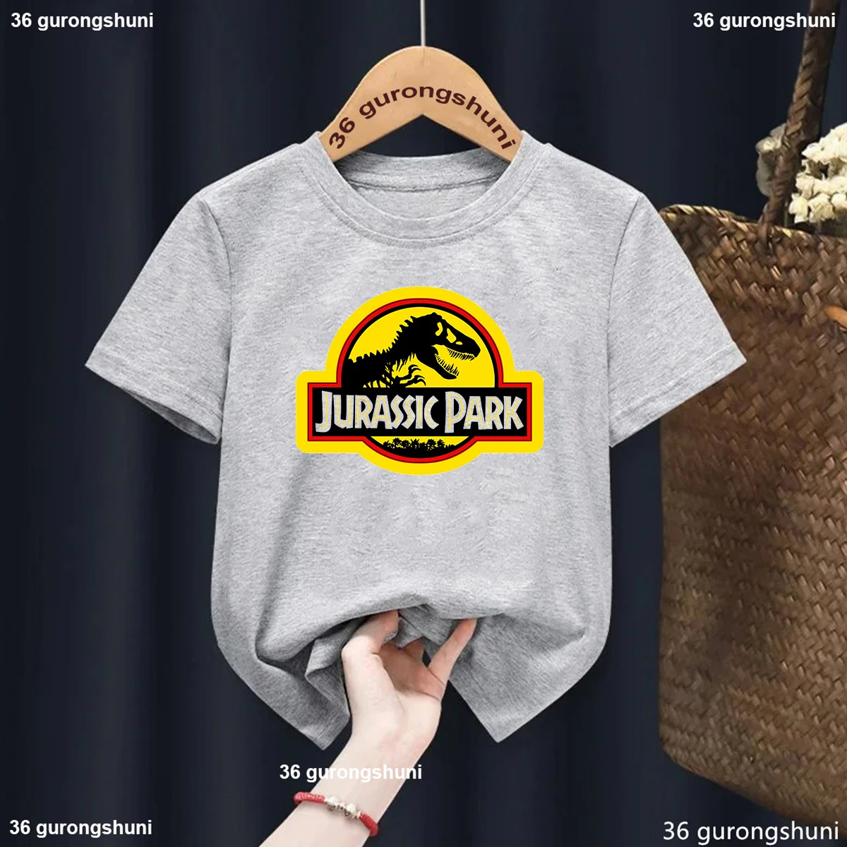 Camiseta con estampado gráfico de dinosaurio de Mundo Jurásico para niños, ropa Harajuku de manga corta, 2024