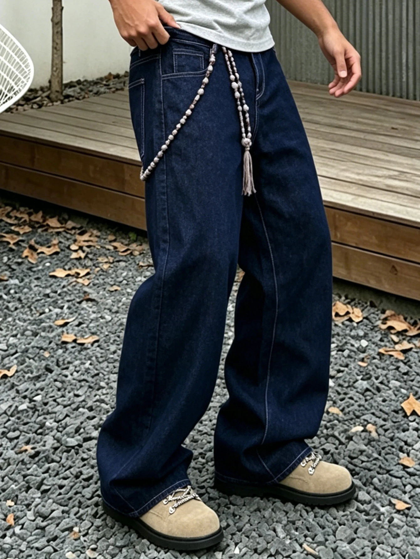 Denim Blue Dark Topstitched Wide-Leg Jeans Are the Same for Men and Women. They Are High-Waisted, Loose and Floor-Length. They A