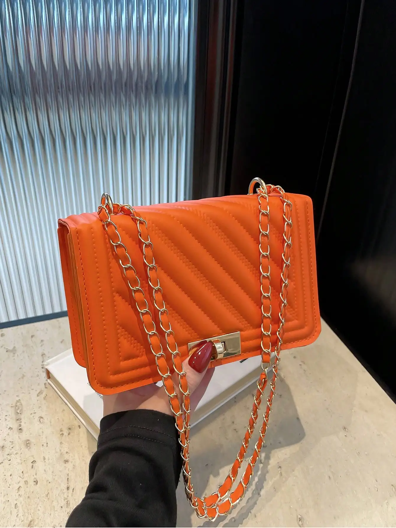 

Vibrant Orange Quilted PU Mini Crossbody Bag with Gold Chain Strap
