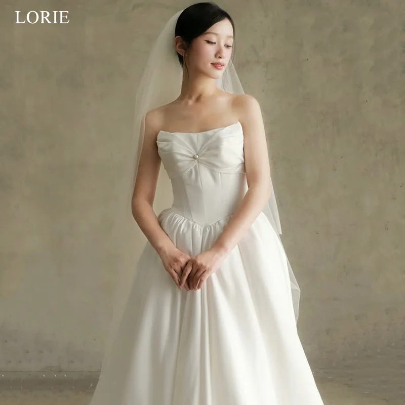 LORIE elegante satijnen strapless trouwjurken a-lijn mouwloze bruid galajurk strik parels geplooide bruidsjurken op maat