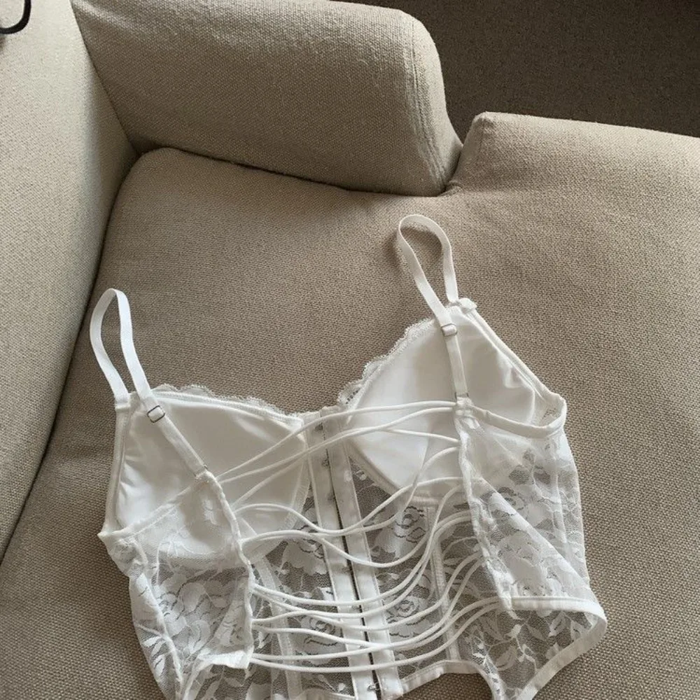 Dünne Mode rücken freie Weste sexy Spitze ärmellose Weste Vintage Korsett