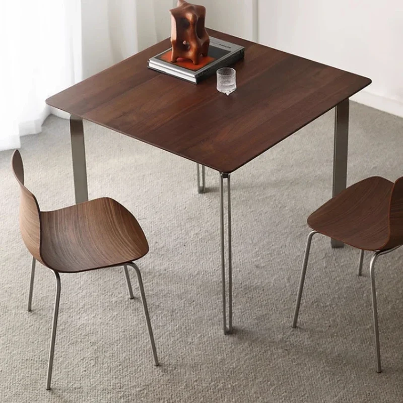 

Modern simple rock slab dining table, rectangular household small apartment minimalist stainless steel dining table