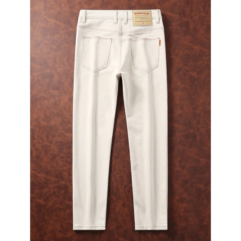 Jeans bianchi alla moda da uomo stile autunnale semplice moda casual abbigliamento da uomo slim fit piccoli pantaloni di lusso leggeri a tubo dritto