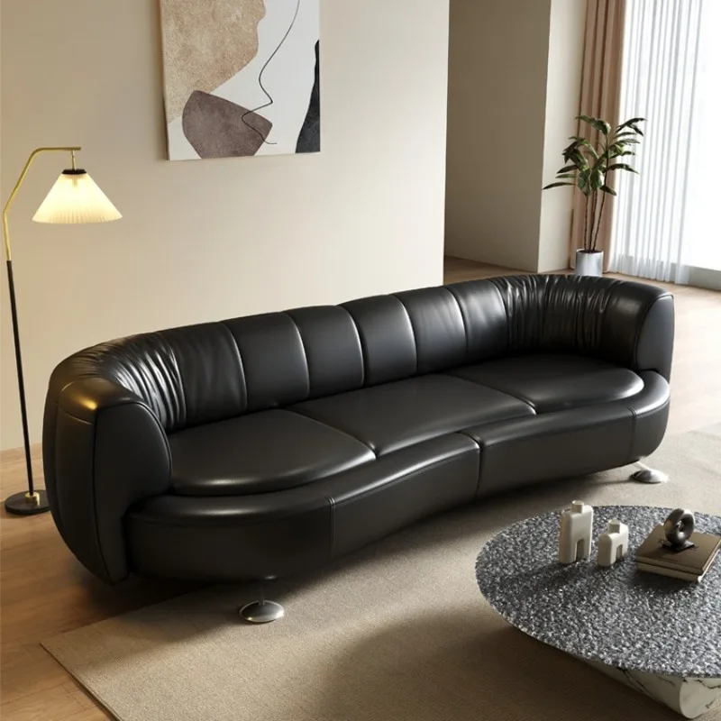 Nordic designer rotating movable, slide rail backrest sofa small apartment living room special-shaped black leather art sofa