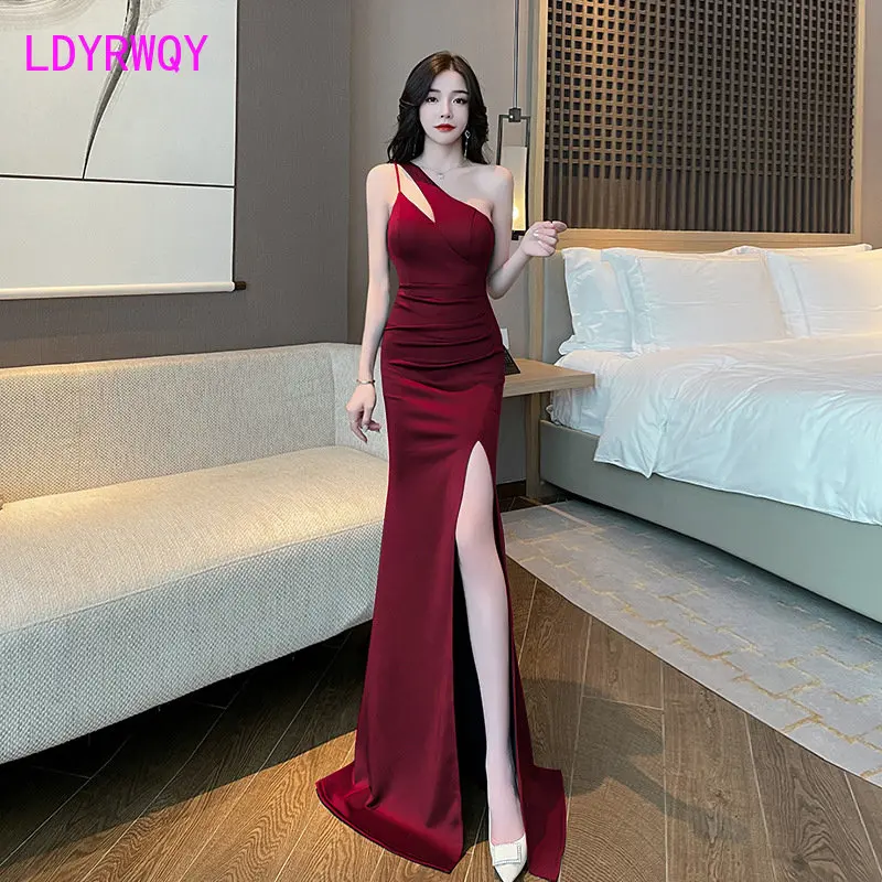 In 2023, the new sexy one-shoulder slim split mop the floor long skirt nightclub wrapped temperament sling.Dresses