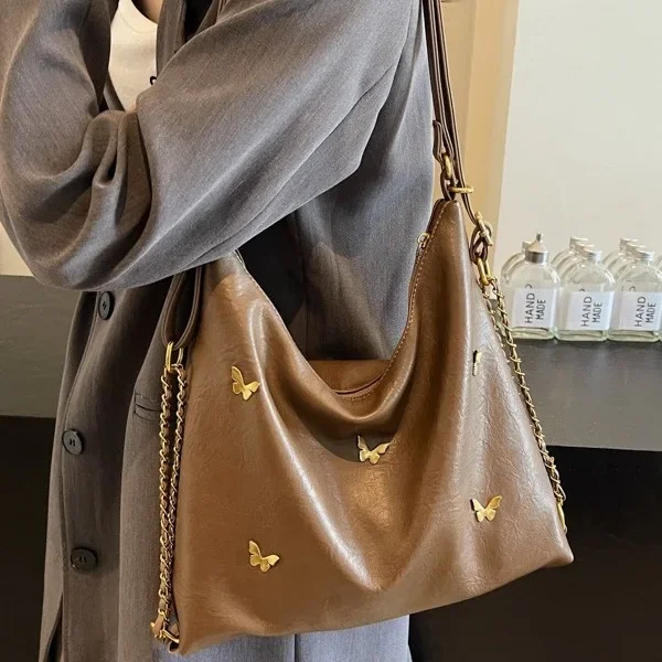 

2024 Hot Selling New Fashion Commuter Retro Large Capacity Butterfly Backpack Multi-shoulder Tote Bucket Bag Handbags Purse