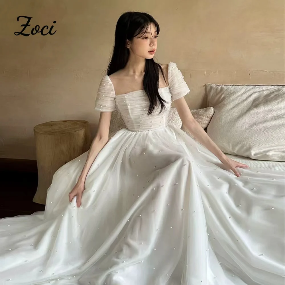 

Zoci Customized Square Neck Pearls Tulle Korea Wedding Party Dresses Photos Shoot Short Sleeve Fairy Bride Gowns
