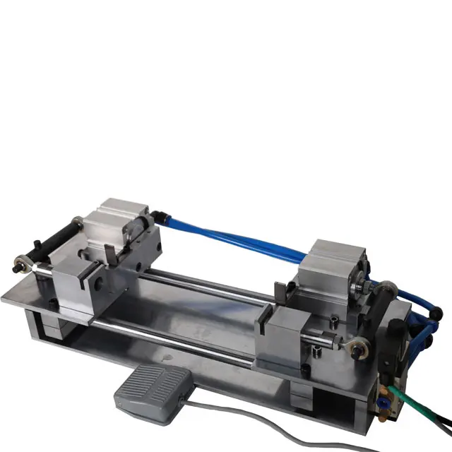 

Semi-circle hole punching machine for rigid boxes