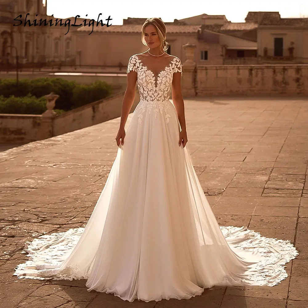 

ShiningLight Boho V Neck Wedding Dresses Cap Sleeves Illusion Lace Applique Court Train Chiffon A-Line Bridal Gowns Customized