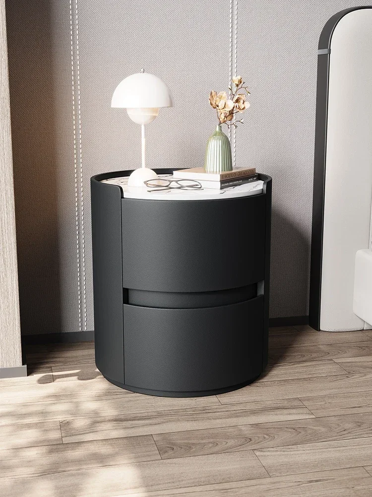 Italian minimalist rock slab round bedside leather bedroom storage cabinet solid wood complete storage cabinet