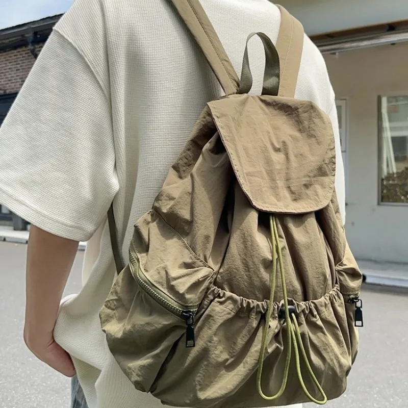 Men's folding backpack, suitable for hiking, traveling, and outdoor exploration, with large capacity for easy storage