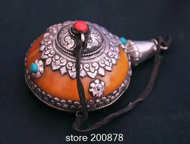 

Тибетская бутылочка для табака с драконьим колпачком, золотистая, из смолы и пчелиного воска, коллекционная, с изображением тибетского дракона.