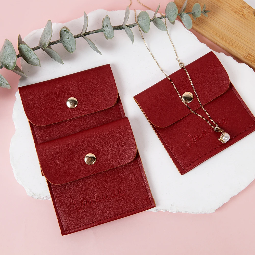 Bolsa de joyería con logotipo personalizado, bolsa de regalo con botones de cuero PU rojo, bolsas de joyería con cierre a presión, perfecta para anillos, collares y dijes