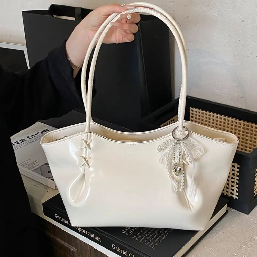 

Повседневная элегантная осенне-зимняя сумка подмышки с подвеской, темпераментная дорожная сумка, универсальная французская большая сумка из искусственной кожи для девочек