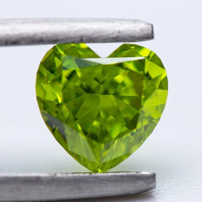 

Cubic Zirconia Apple Green Color Heart Shape 5A Grade 4k Crushed Ice Cut Charm Beads for DIY Jewelry Making Pendant Materials