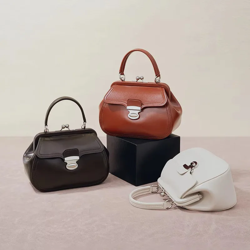 

New Korean Light Luxury Style Clip On Fashionable Niche Crossbody Bag Leather Genuine Leather Bag Female Bag Top-handles Handbag