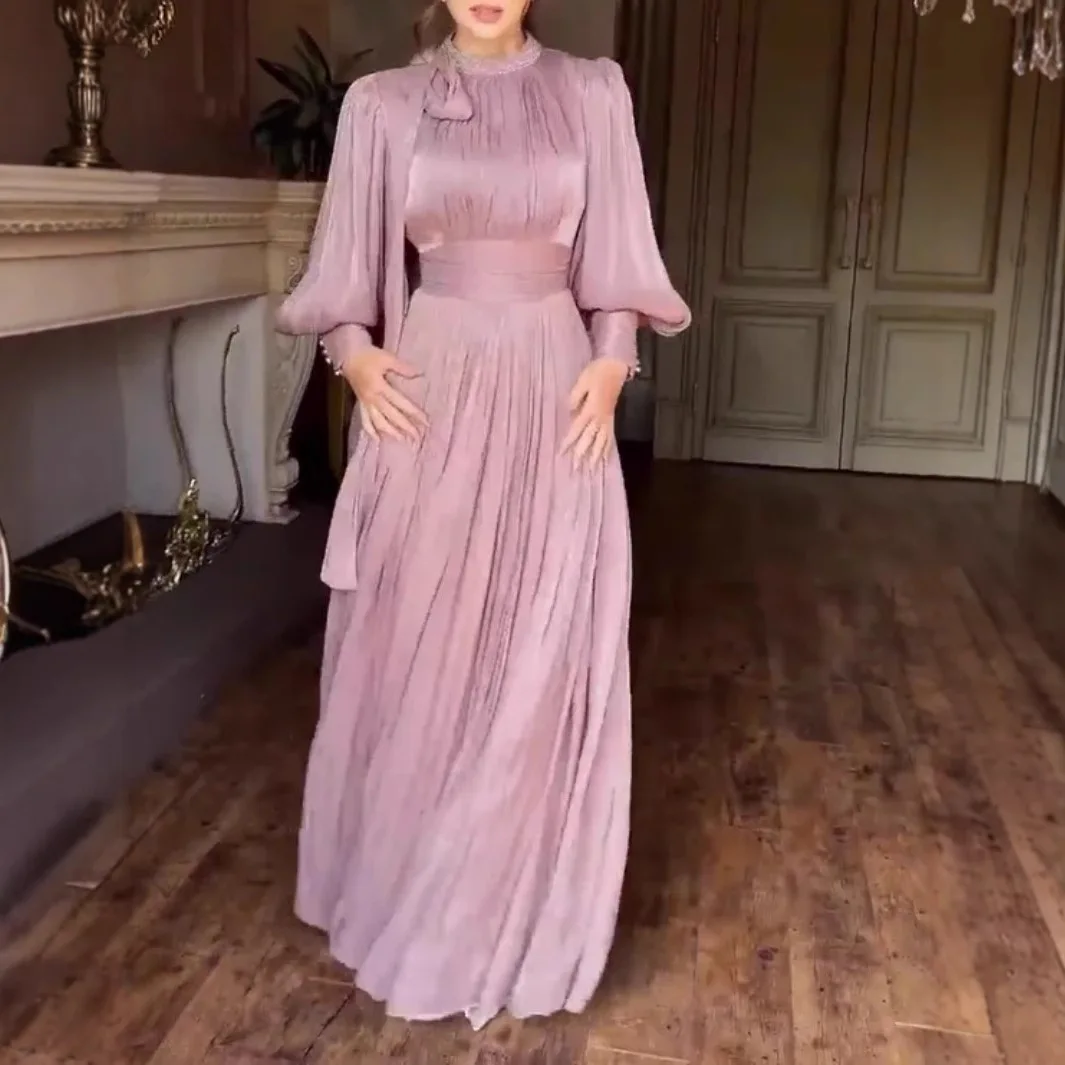 New Autumn and Winter Styles for Women. A Long Evening Dress with Hot-fixed Rhinestones, A Cinched Waist and Tie Straps.